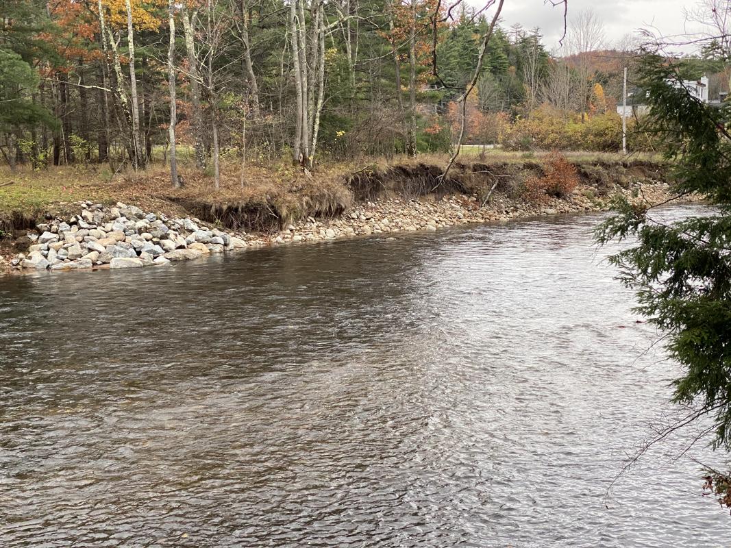 Before construction, water main under riprap