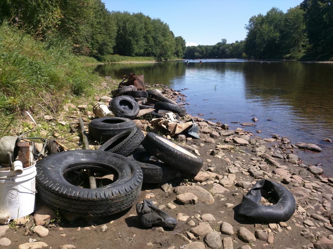 Tires and scrap pulled out of the river