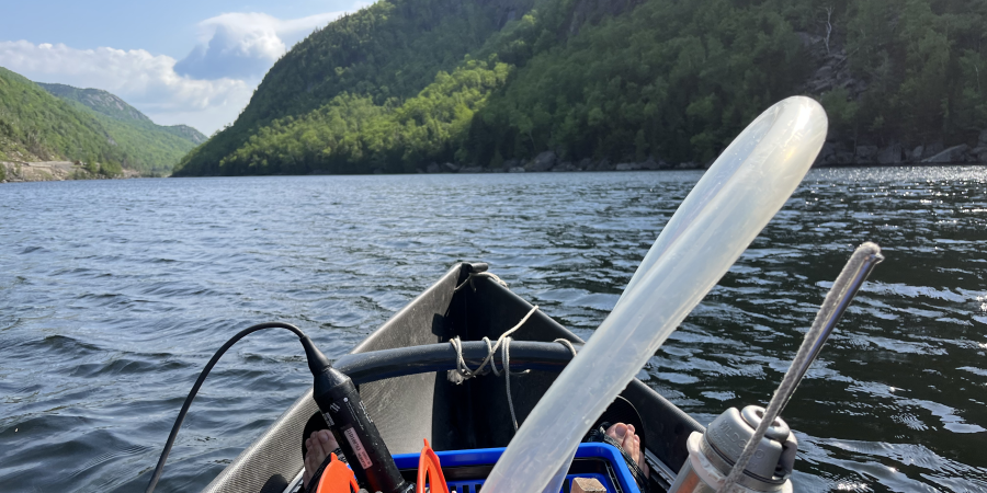water quality monitor tools in a boat on a lake