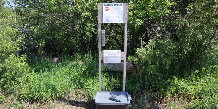 Wader wash station with green in background